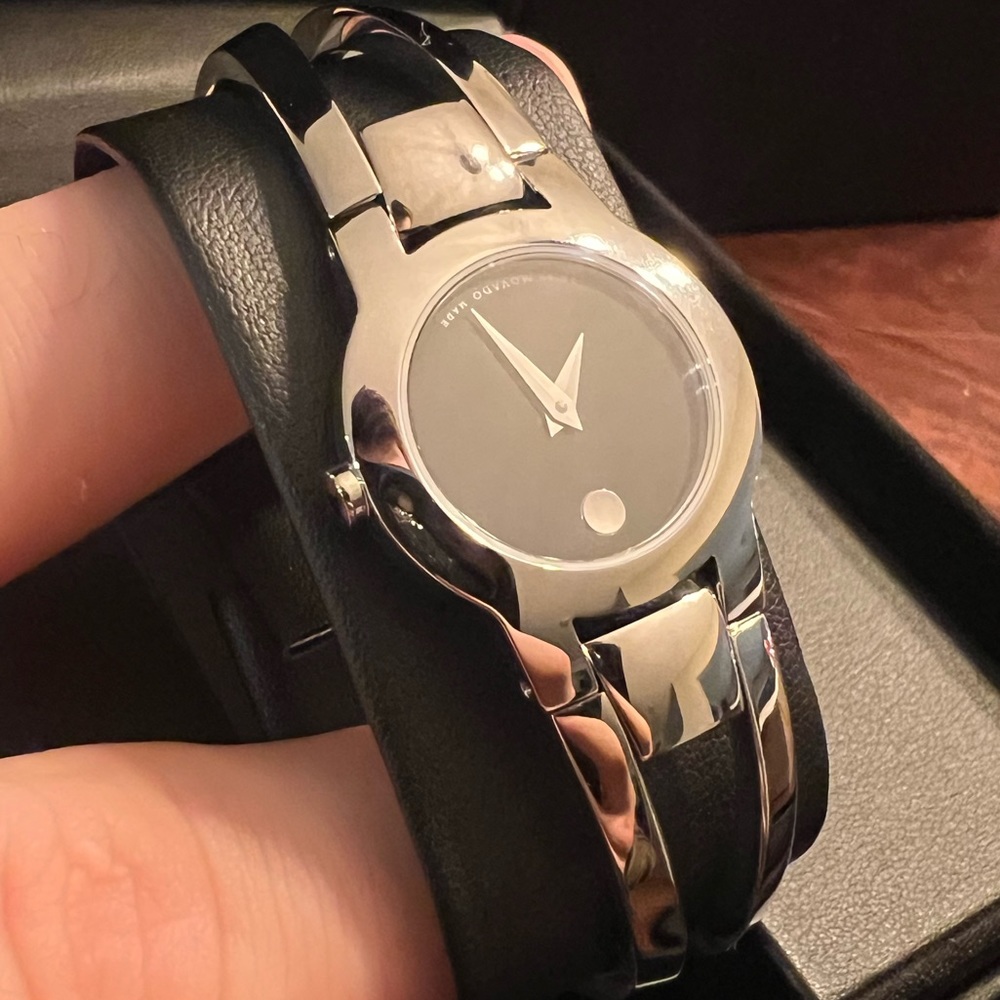 Ladies Movado Amorosa 1/15 CT. T. W. Diamond bangle watch w/ black dial
